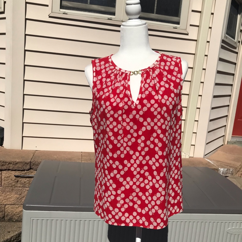 Trina Turk sleeveless top.  Red/white with decorative gold chain at neckline